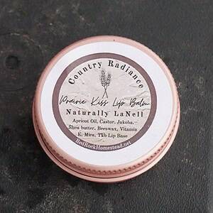 Lip balm with natural ingredients, apricot oil, beeswax, shea butter, and vitamin E from Red Rock Homestead.